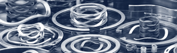 assortment of different types of smalley wave springs and retaining rings